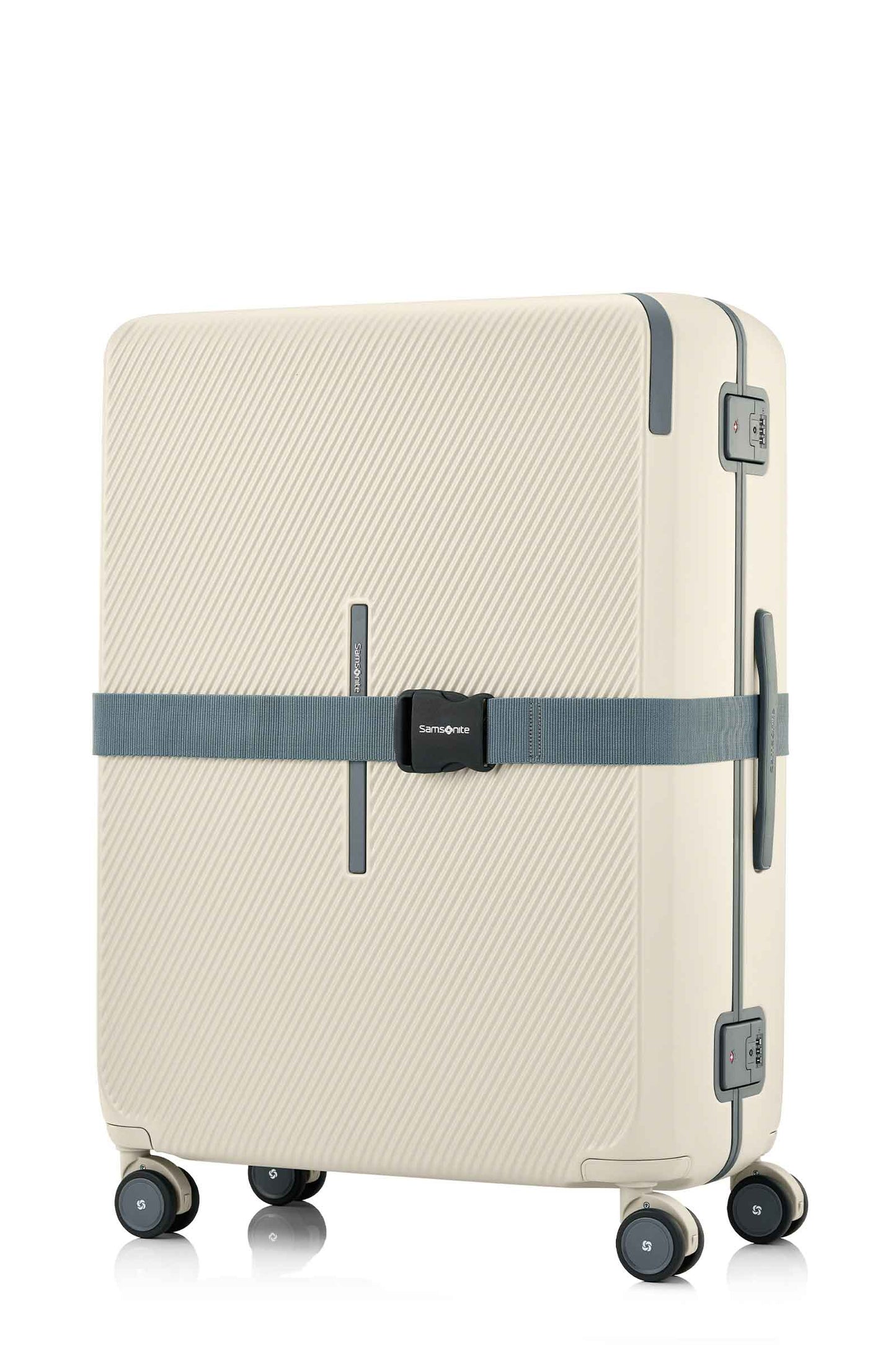 Angled view of the Evox Spinner Large luggage in Beige strapped. Shop the Collection Online.