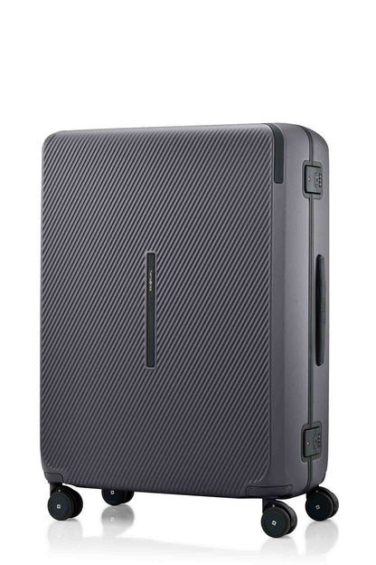 Angled view of the Evox Spinner Large luggage in Graphite. Shop the Collection Online.