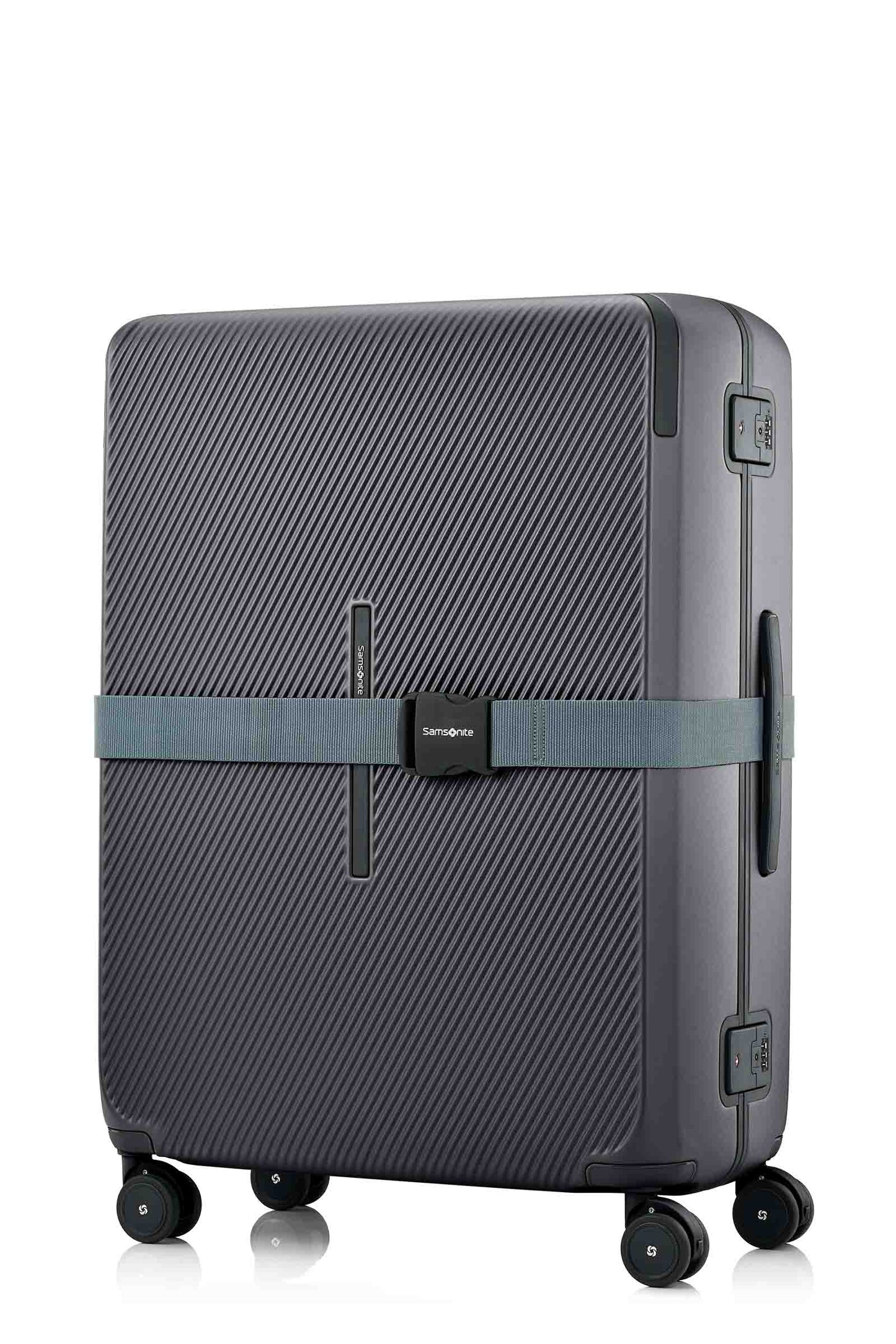 Angled view of the Evox Spinner Large luggage in Graphite strapped. Shop the Collection Online.