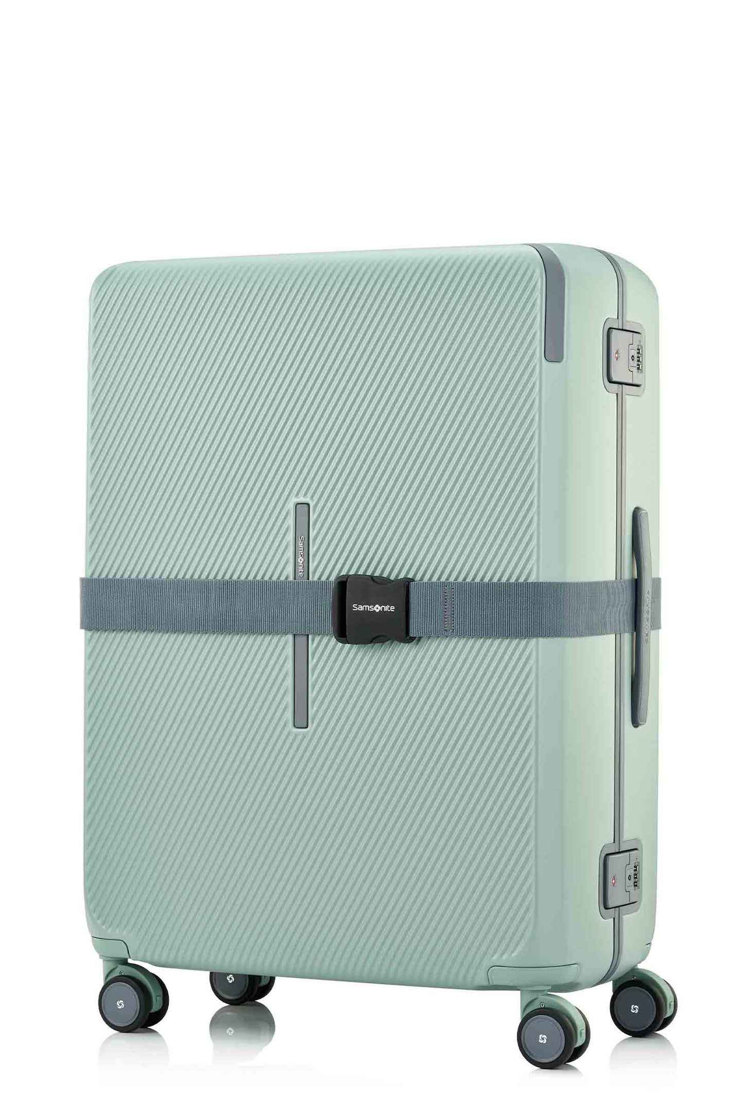 Angled view of the Evox Spinner Large luggage in Mint strapped. Shop the Collection Online.