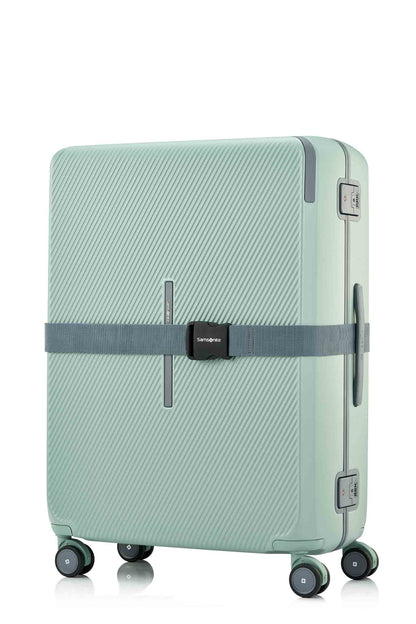 Angled view of the Evox Spinner Large luggage in Mint strapped. Shop the Collection Online.