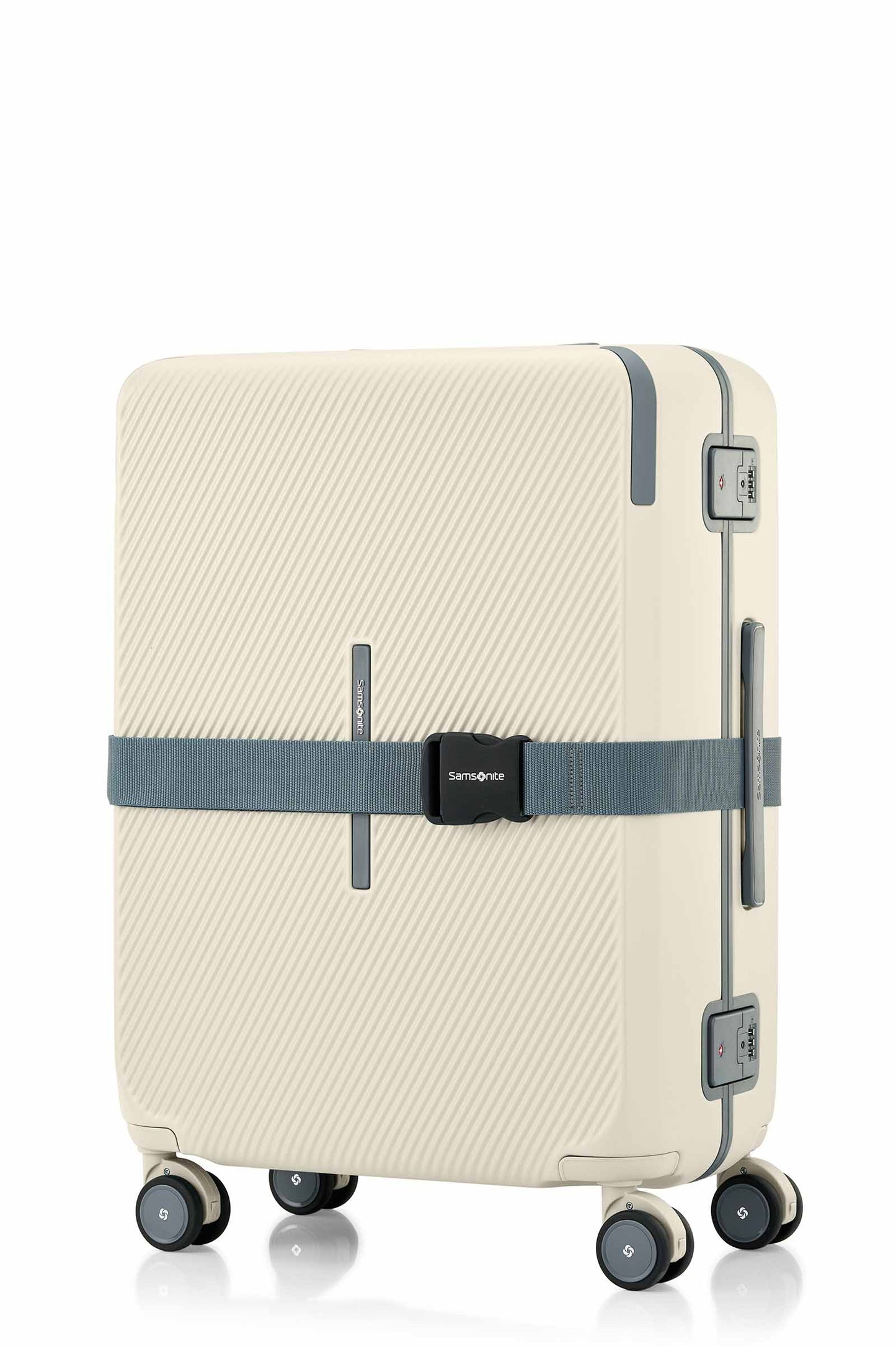Angled view of the Evox Spinner Medium luggage in Beige strapped. Shop the Collection Online.