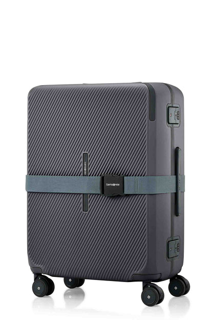 Angled view of the Evox Spinner Medium luggage in Graphite strapped. Shop the Collection Online.