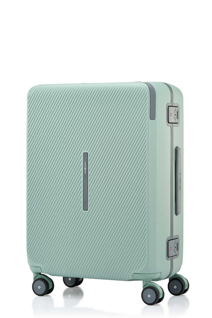 Angled view of the Evox Spinner Medium luggage in Mint. Shop the Collection Online.