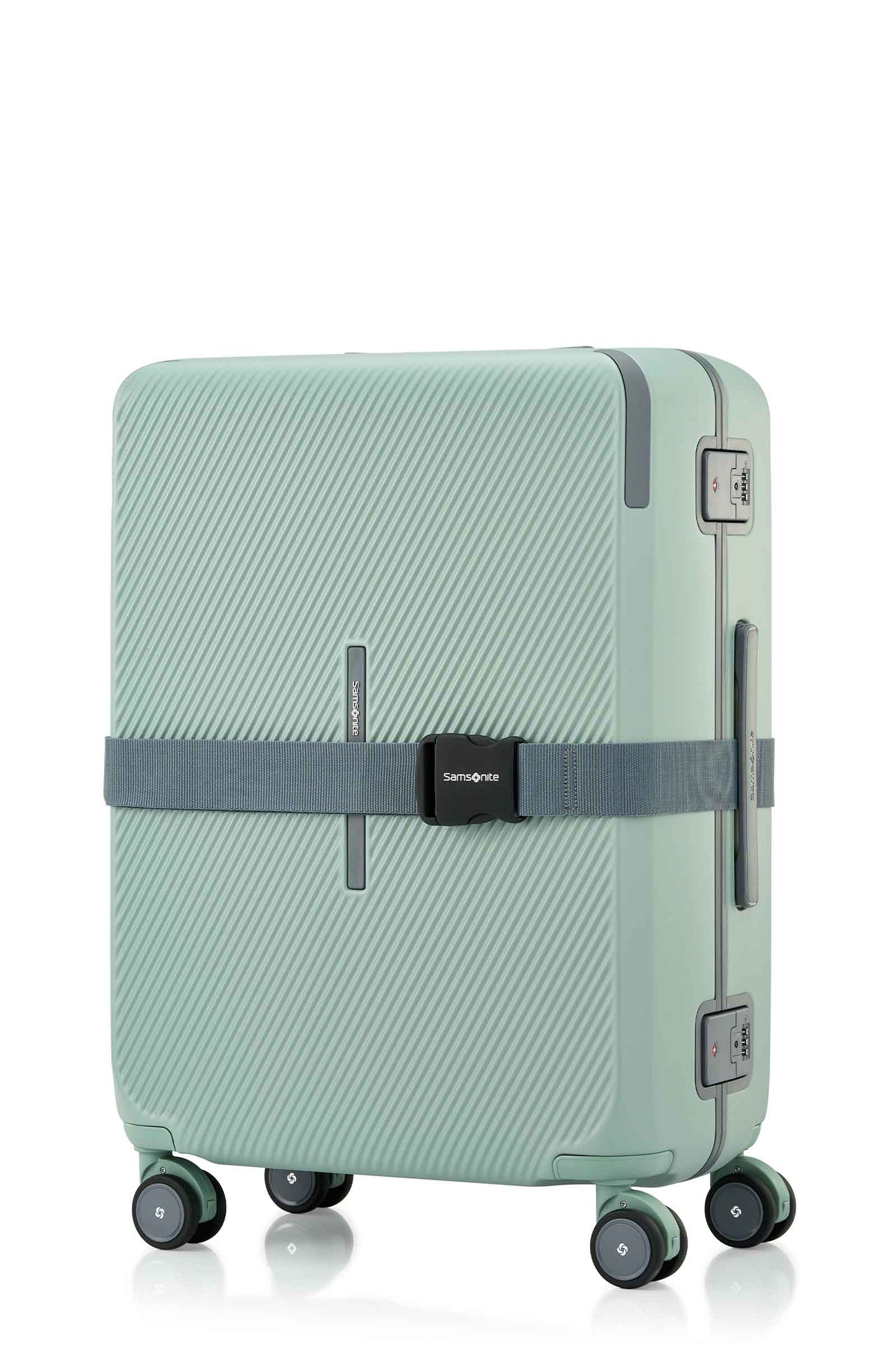 Angled view of the Evox Spinner Medium luggage in Mint strapped. Shop the Collection Online.