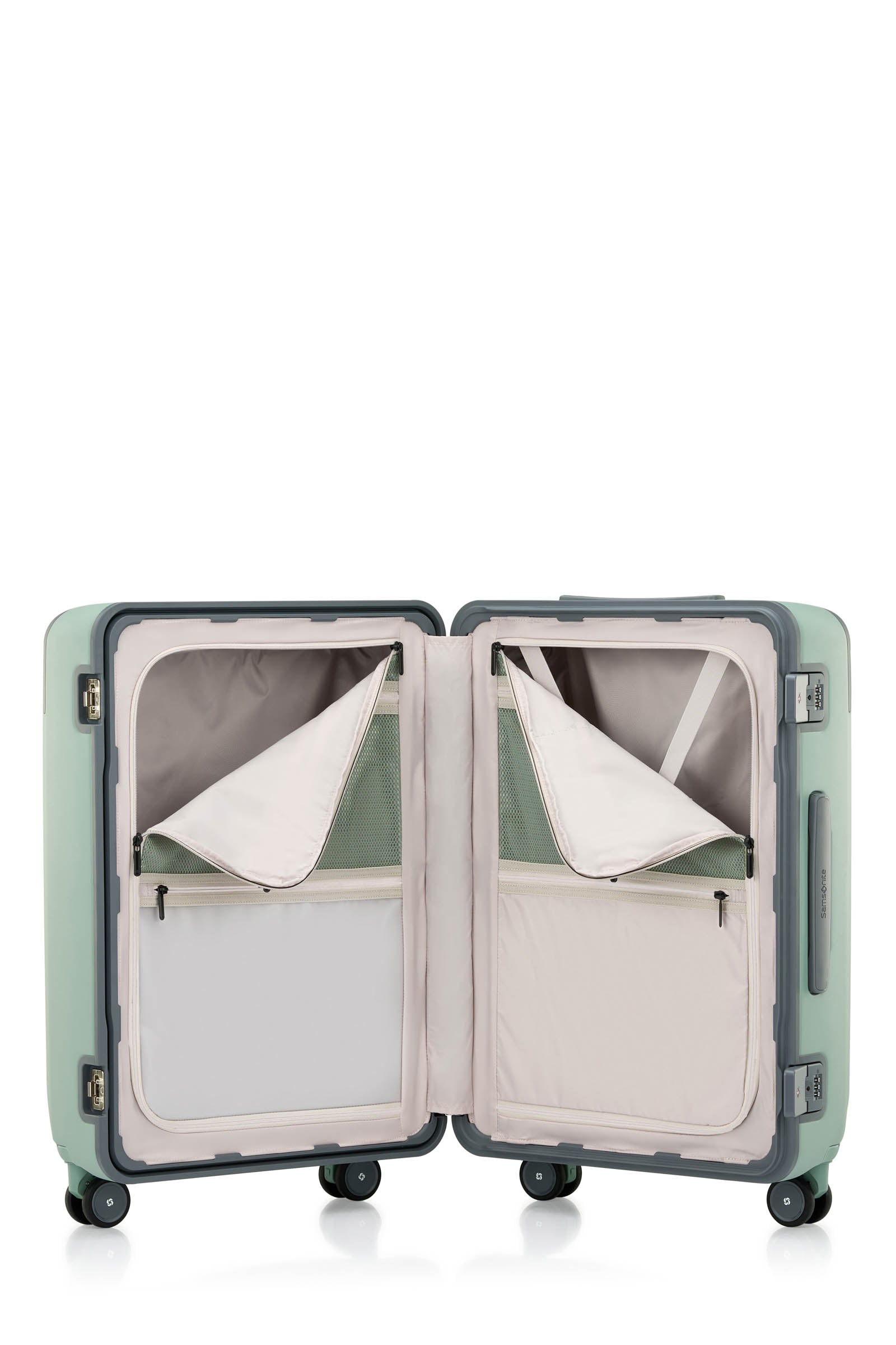 Open interior view of the Evox Spinner Medium luggage in Mint. Shop the Collection Online.