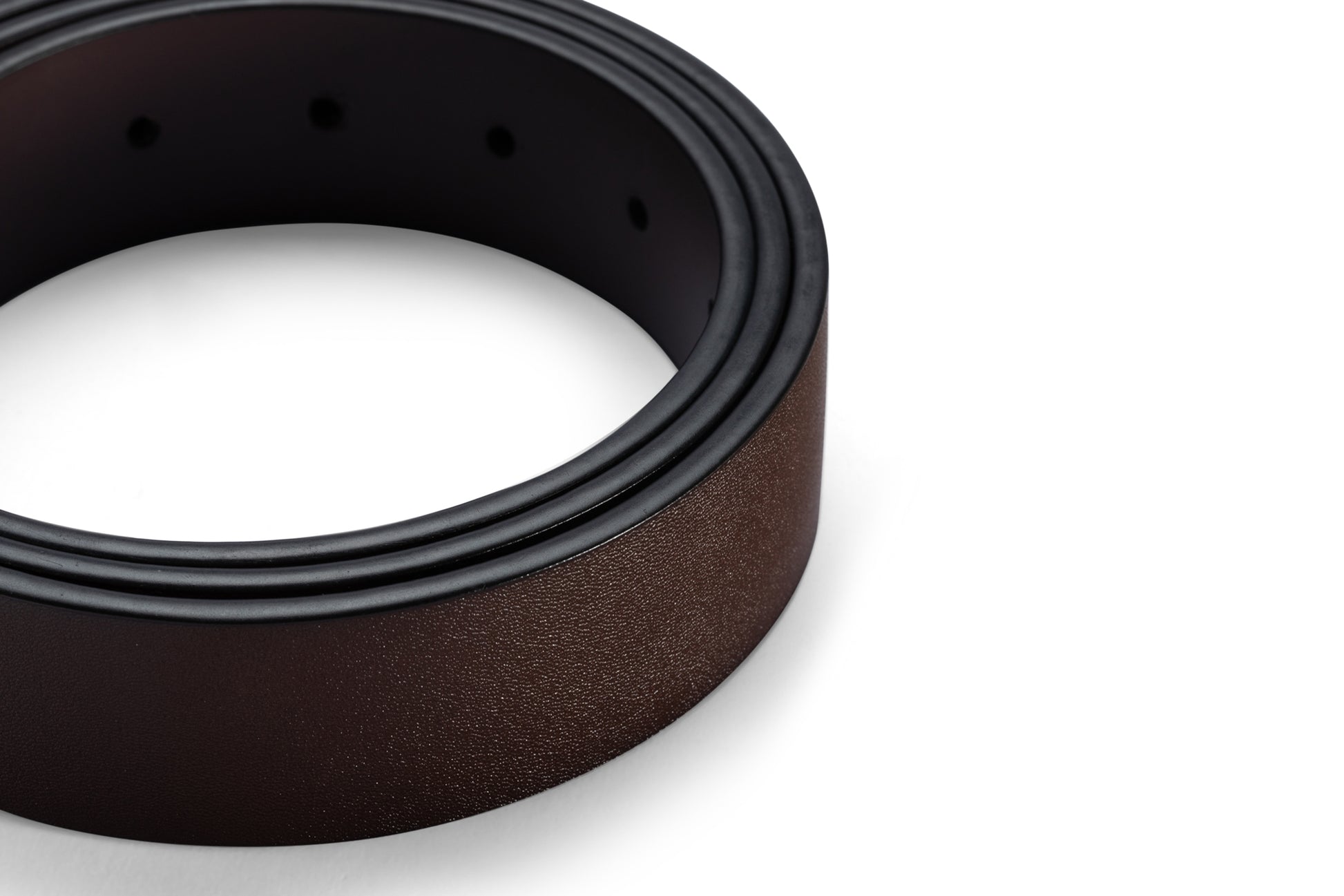 Rolled up belt view of the AAMIR II BIZPIN PLATE 02 BELT. Shop Now Online.