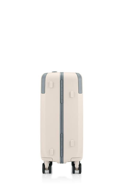 Side view of the Evox Spinner Cabin luggage in Beige. Shop the Collection Online.