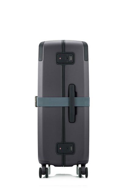 Side view of the Evox Spinner Large luggage in Graphite strapped. Shop the Collection Online.