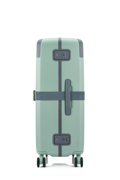 Side view of the Evox Spinner Large luggage in Mint strapped. Shop the Collection Online.