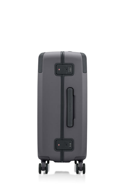 Side view of the Evox Spinner Medium luggage in Graphite. Shop the Collection Online.