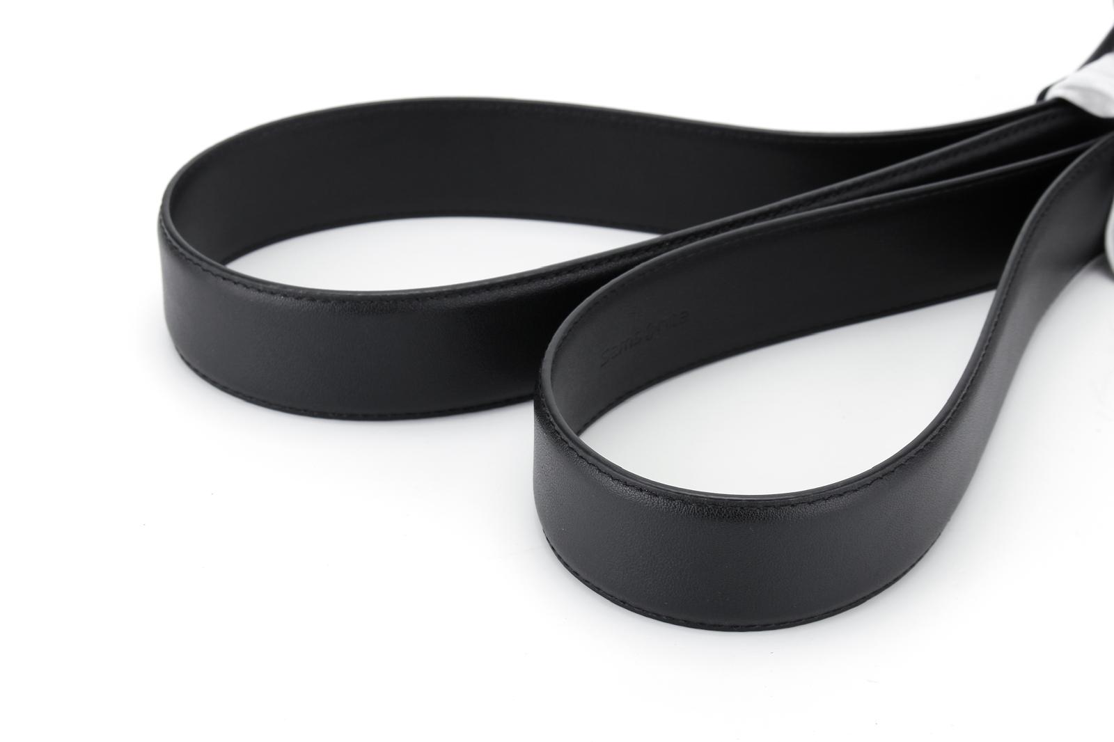 stitching front view of the AAMIR Basic Auto Golden Logo Belt in Black. Shop Online Today.